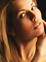 Nika raises the temperature with her provocative and highly erotic poses in a studio photo shoot.