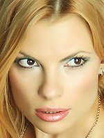 Confident blonde with refined, sublty erotic poses.