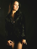 Sultry babe with lustrious black hair and hypnotic eyes.