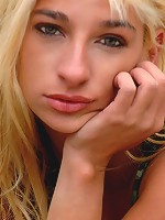 Captivating model with luscious breasts and delectable ass.