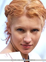 Immaculately dressed in a white dress, Mila portrays a young maiden, carefree and innocent with no hint of inhibitions.