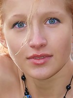 Immaculately dressed in a white dress, Mila portrays a young maiden, carefree and innocent with no hint of inhibitions.