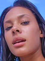 An outdoor shoot featuring Danica's tanned and oiled body.