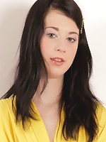 Nubiles.net Lolly Pop - Seductive hottie loosens up on the couch to finger her craving pussy