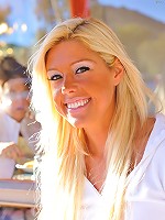 Tiffany shows off her shaved pussy