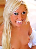 Tiffany shows off her shaved pussy