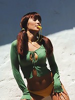 Zemani.com Olga - Beautiful referee in the yellow form shows her skill and nice sexy body outdoor.